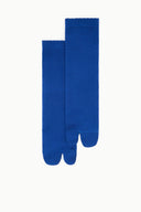 Tabi socks pair in blue with split toe design and ribbed crew cuff