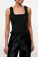 Black sleeveless top with ruffled straps, square neckline, and gathered hem