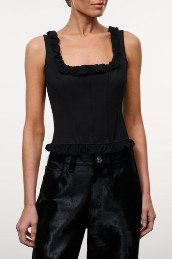 Black sleeveless top with ruffled straps, square neckline, and gathered hem