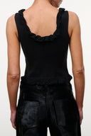 Black sleeveless top with open back and ruffled neckline