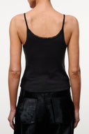 Black tank top with spaghetti straps and lace-trim scoop back