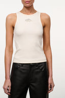 Ivory sleeveless tank top with ribbed knit, small chest dino logo, straight hem.