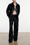 Black haircalf pants with relaxed straight legs and front fly detail