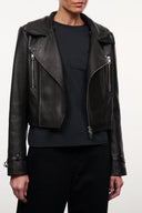 Black leather jacket with shearling-trim collar and wide lapel zippers