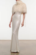Ivory fringe shrug with high neck, short sleeves, and loose draped fit