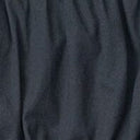 Close-up of black ruched fabric on peplum top
