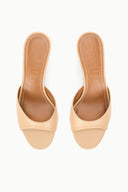 Pair of tan open-toe wedge sandals with contoured footbed
