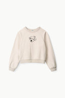 Stone cropped crewneck sweatshirt with dog face graphic