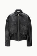 Black leather bomber jacket with zip front, stand collar, flap pockets, ribbed hem