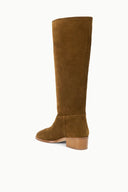 Cigar brown suede knee-high boot with stacked block heel and pull-on design