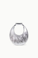 Silver crescent shoulder bag with top handle and snap closure