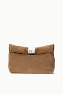 Husk brown cuff clutch with silver snap closure and compact fold-over shape