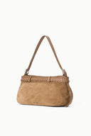 Tan suede shoulder bag with woven front trim and silver buckle, side view