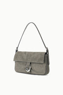 Gray suede shoulder bag with front flap, clasp hardware, and short top handles