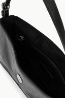 Black leather handbag interior with zipper and top hardware, side view