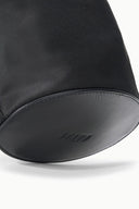 Black mini bucket bag bottom and side seam with smooth leather-look panel trim