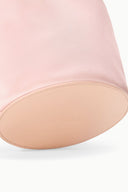 Blush mini bag base with tan leather trim and stitched edge