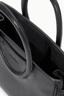 Black Maude mini carryall bag with textured finish, side panel and handle loop