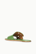 Green leaf-pattern slide sandal with tan sole and cutout strap