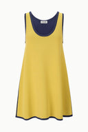 Yellow sleeveless dress with navy U-neck trim and inner neck brand tag