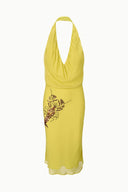 Citron yellow halter dress with embroidered insect motif on front