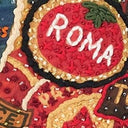 Close-up of multicolor printed skirt fabric with patch-style Roma lettering
