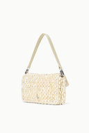 Cream woven shoulder bag with flap and adjustable-length shoulder strap