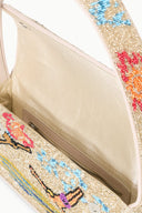 TOMMY beaded bag with open top showing beige fabric lining and colorful bead exterior
