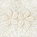 White beaded handbag fabric texture with small bead pattern detail.