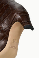 Croc-texture ankle boot showing inner ankle opening and small logo print