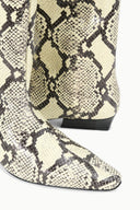 Snake-print flat ankle boot with pointed toe and pull-on side opening