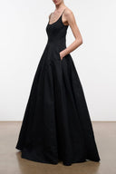 Black maxi dress with spaghetti straps, scoop neck, fitted bodice and flared skirt