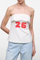 Strapless white graphic top with red "26" front print