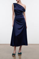 Navy silk dress with draped one-shoulder neckline and sleeveless midi length