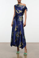 Midnight blue silk dress with gold floral print, off-shoulder tie sleeves, asymmetrical hem